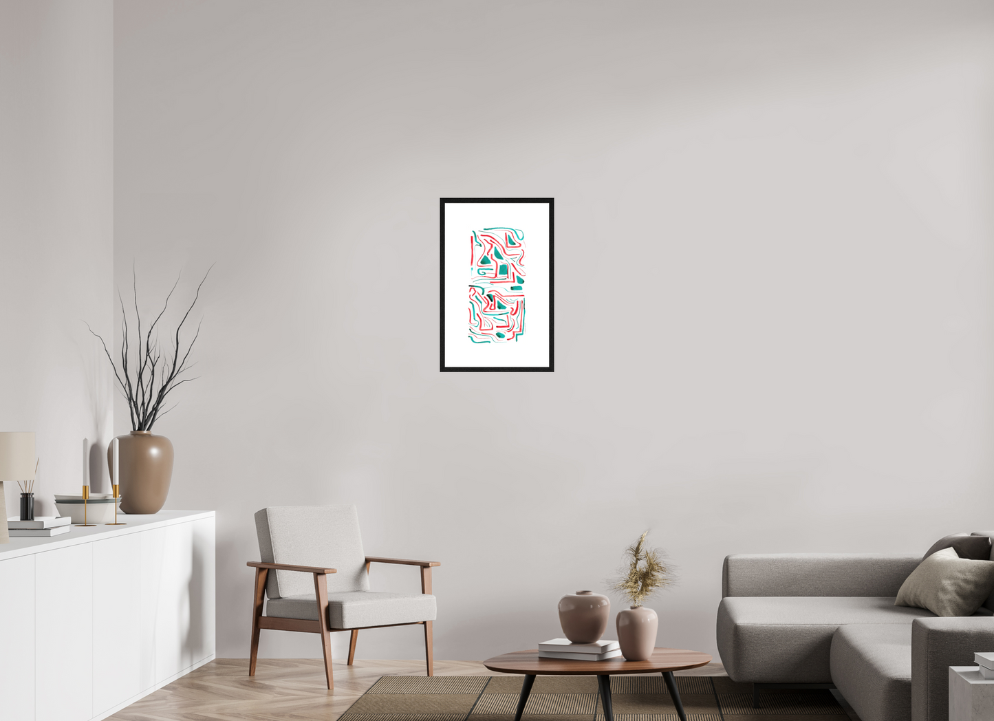 L'image représente un tableau abstrait à l'encre bleue et rouge, encadré et accroché au mur d'une pièce lumineuse. C'est une oeuvre de l'artiste peintre Maeva J.